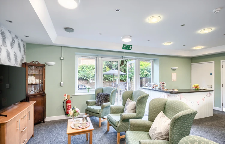 TV Area And Kitchenette At Sandwood Care Home