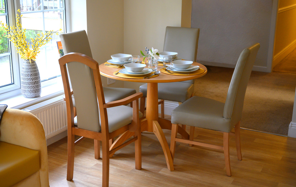 Dining table set for dinner