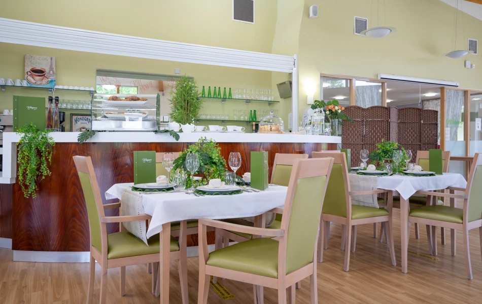 Dining tables and chairs in the restaurant at Girton Green Cambridge