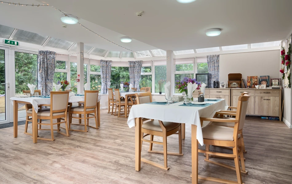 Pratt House communal dining room with table and chairs