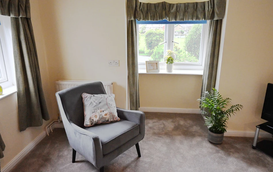 Arnchair In Bedroom At Abbeyfield House, Settle BD24 9RB