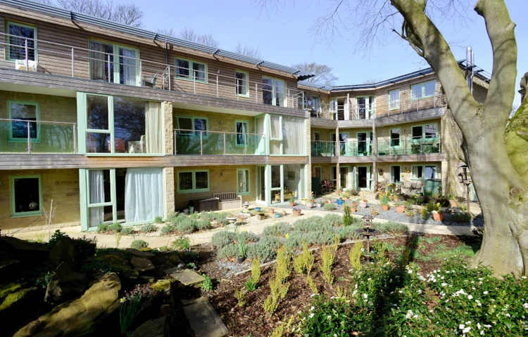The rear of the house with glass balconies