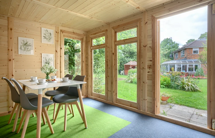 Pratt House summer house with table and chairs