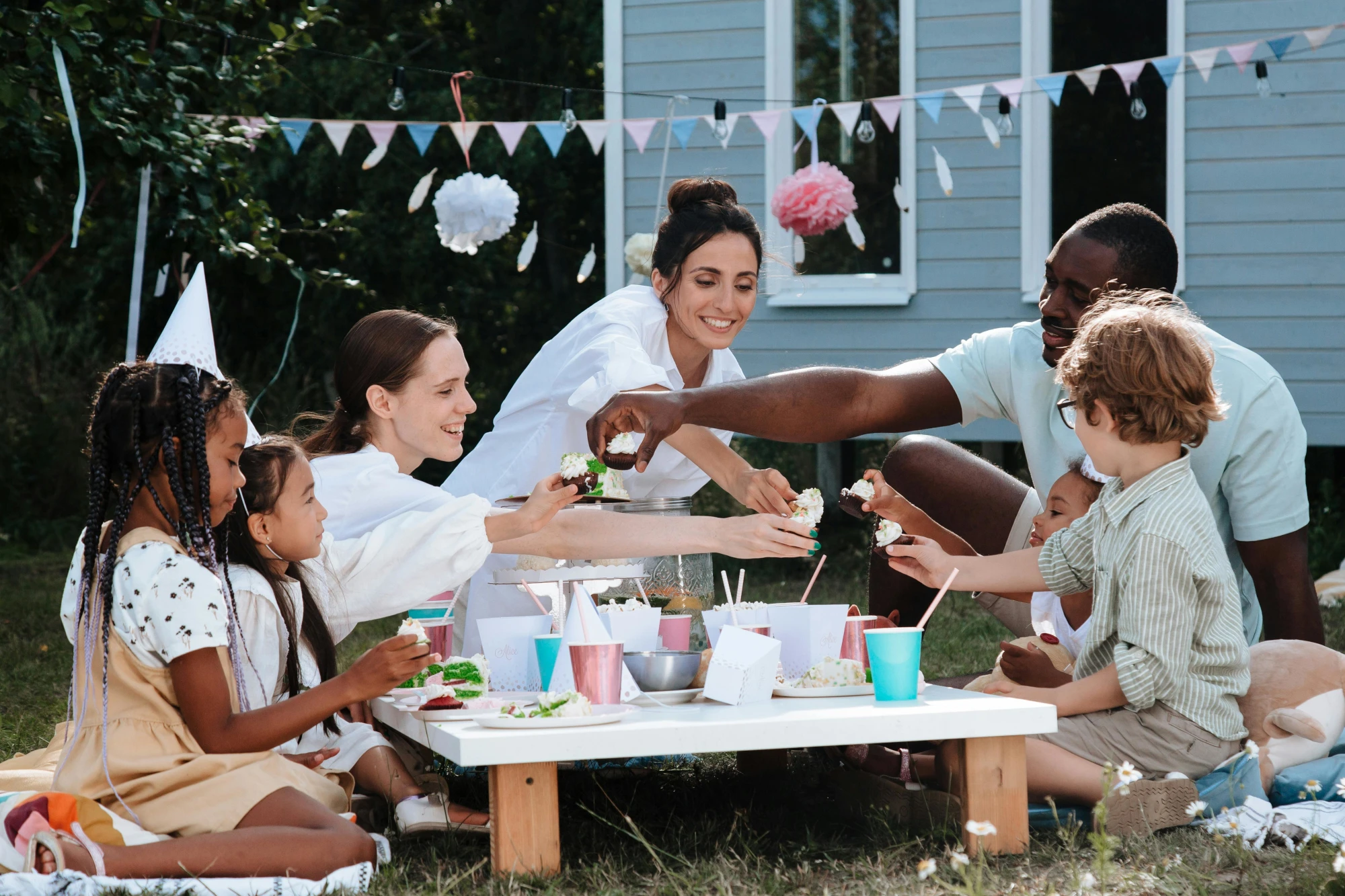 Group of people enjoying a garden party