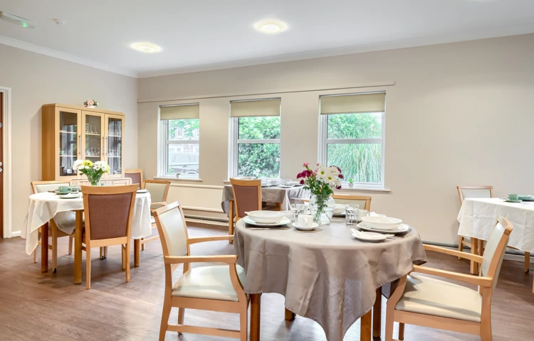 communal-dining-room-set-for-lunch-at Abbeyfield House, Cockermouth CA13 9RH