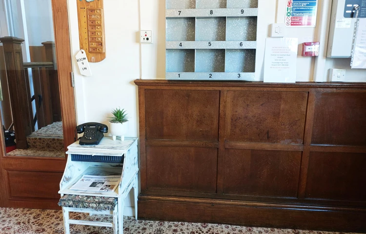 Hallway At Privett Farm House With Old Phone And Mailboxes