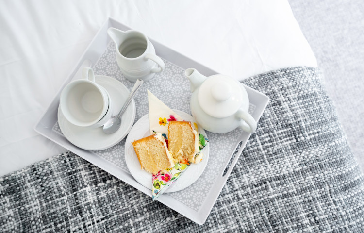 tea-tray-with-cake-on-bed-at-middleton-house.jpg