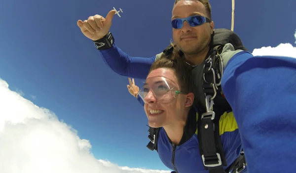 Two People Taking Part In A Skydive