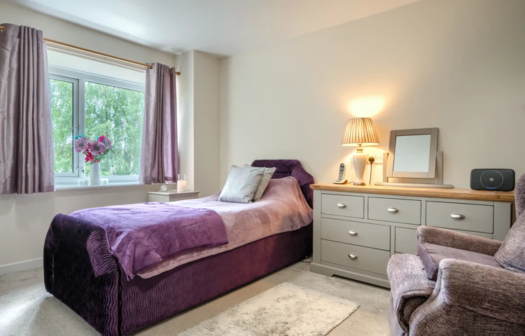 single-bedroom-with-purple-decor-at Abbeyfield House, Lincoln LN1 3HJ