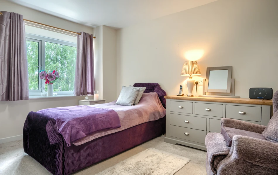 single-bedroom-with-purple-decor-at Abbeyfield House, Lincoln LN1 3HJ
