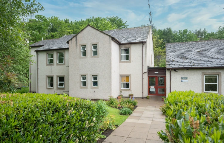 Entrance and front lawn at Abbeyfield House, Cockermouth CA13 9RH