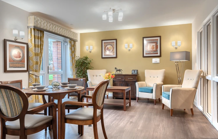 Relaxing communal area at Westall House dementia care home, designed to promote socialising, with a dining area