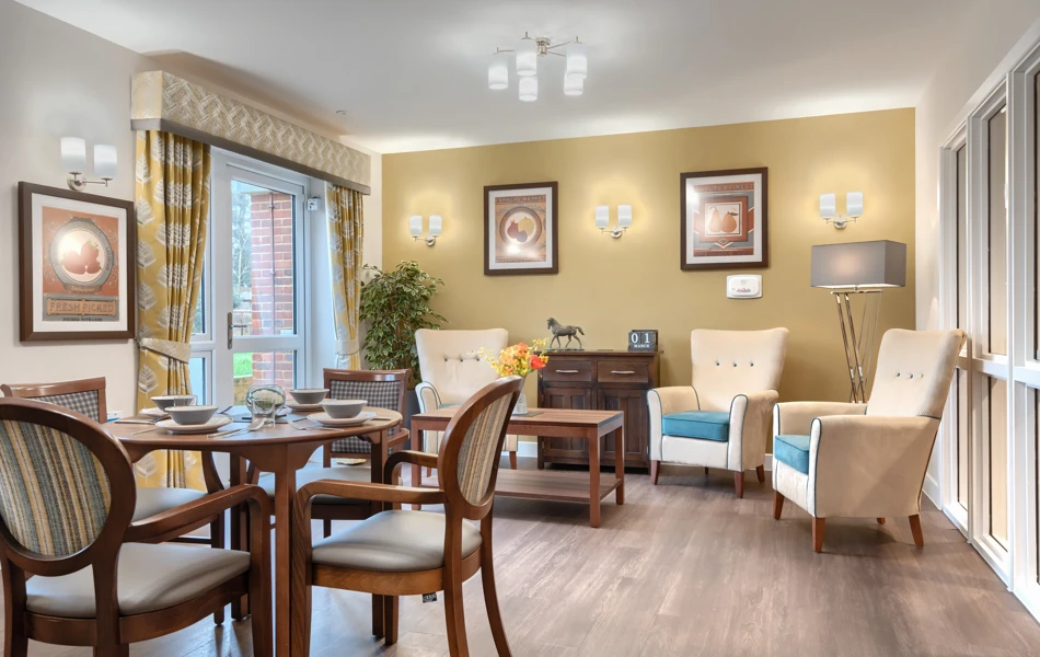Relaxing communal area at Westall House dementia care home, designed to promote socialising, with a dining area