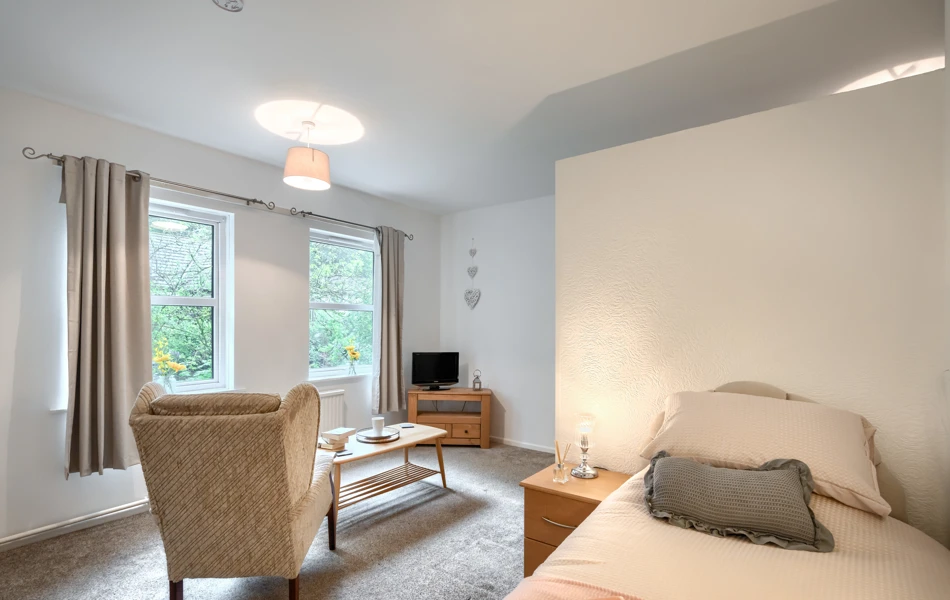 bedroom-and-lounge-area-at Abbeyfield House, Cockermouth CA13 9RH