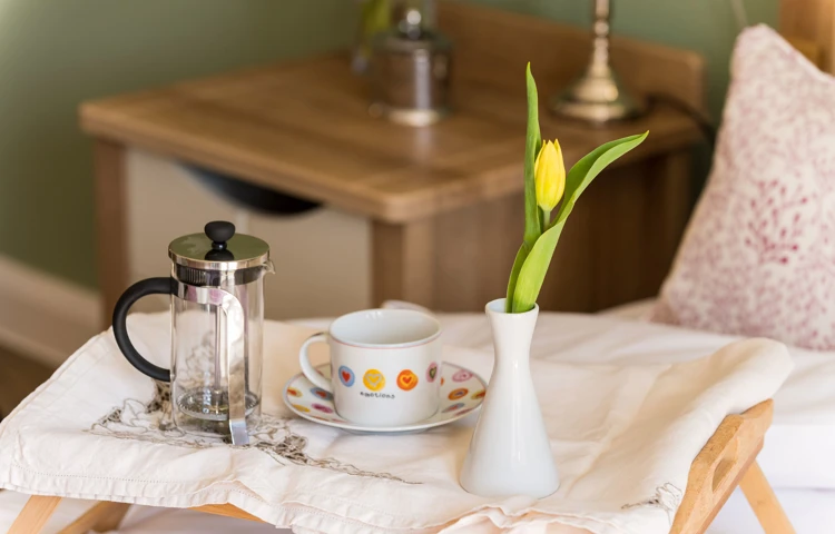 Teacup and saucer on a tray