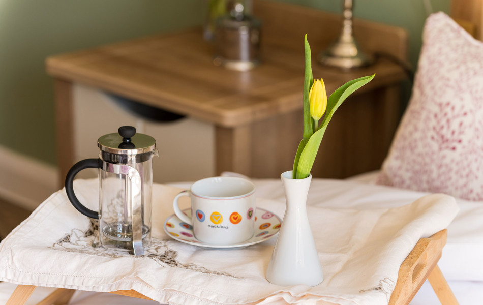 Teacup and saucer on a tray