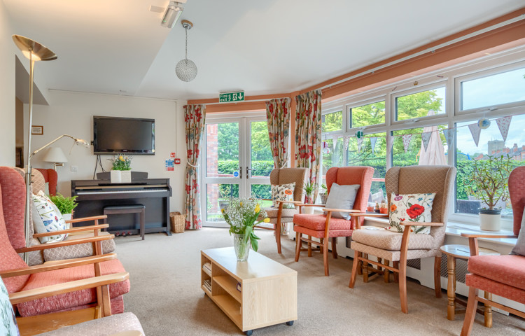 communal-lounge-with-seating-at Abbeyfield House, Lincoln LN1 3HJ