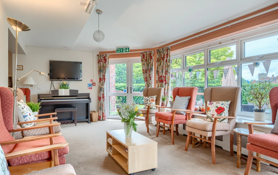 communal-lounge-with-seating-at Abbeyfield House, Lincoln LN1 3HJ
