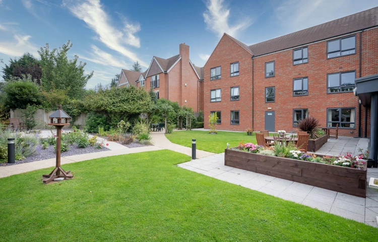 External shot of spacious garden with planter at Hampton House Solihull