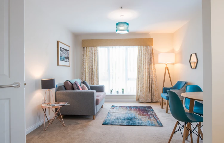 A bright tastefully decorated living room at Hope Bank View