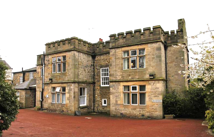 A photo of the castle-like house