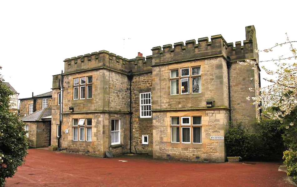 A photo of the castle-like house