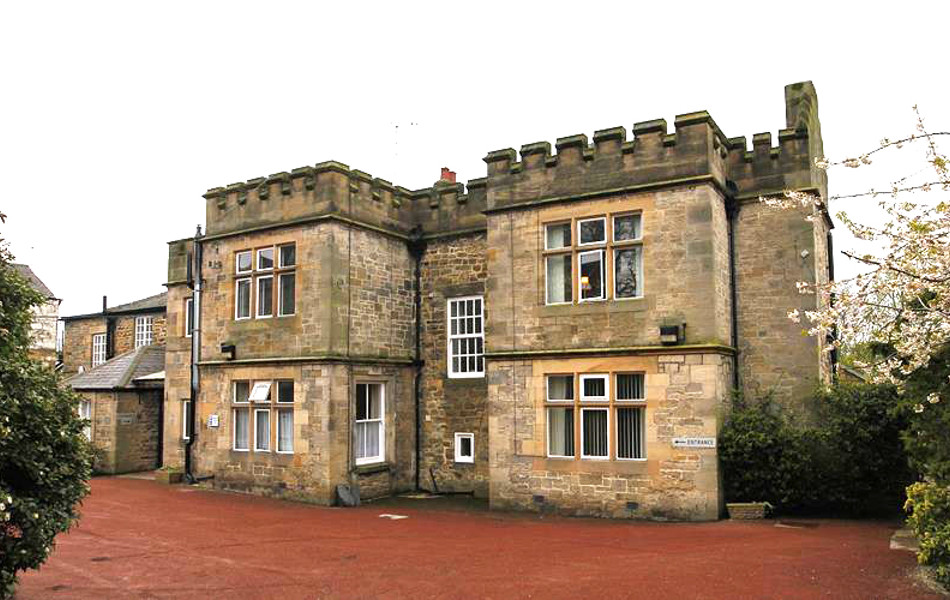A photo of the castle-like house