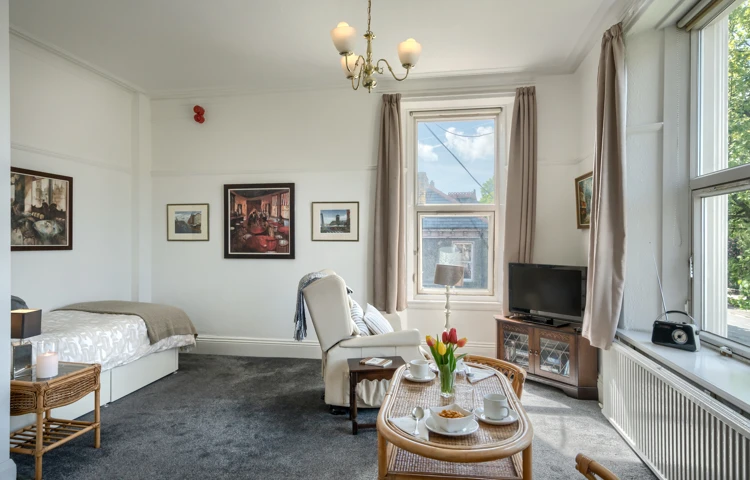 single-bedroom-with-lounge-area-at-Abbeyfield House, Ulverston LA12 0BY