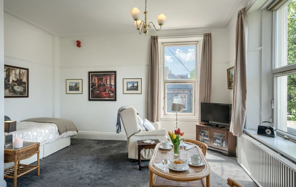 single-bedroom-with-lounge-area-at-Abbeyfield House, Ulverston LA12 0BY